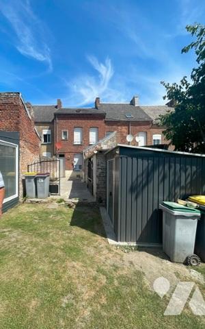 UNE MAISON A USAGE D'HABITATION