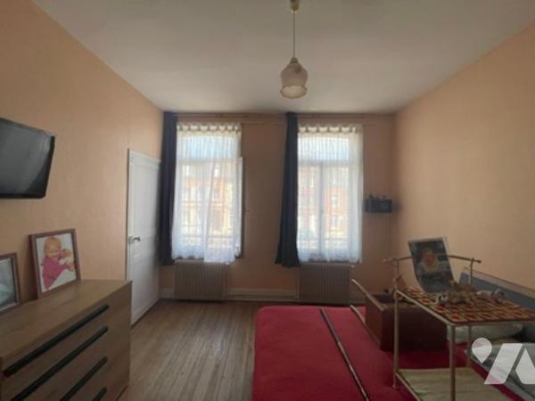 UNE MAISON A USAGE D'HABITATION