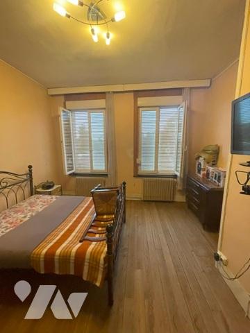 UNE MAISON A USAGE D'HABITATION