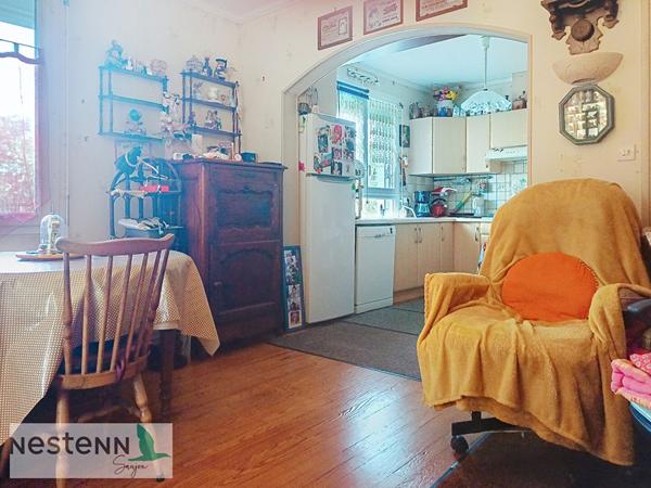 A vendre maison 70m², 2 chambres, un bureau, garages, terrain dans quartier résidentiel de 678 m²