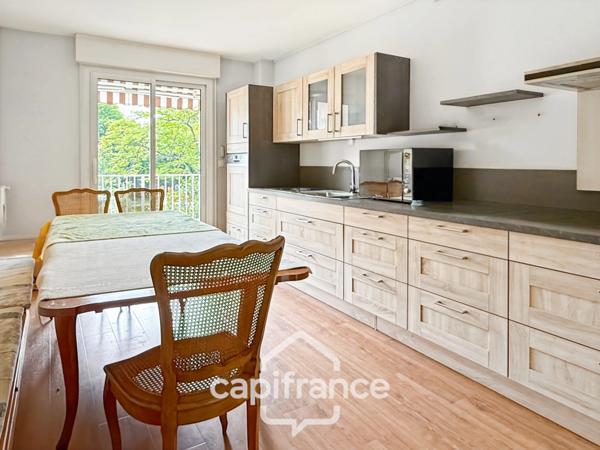 Exceptionnel: appartement 122 m2, 3 chambres, garage, cave à Saint Symphorien