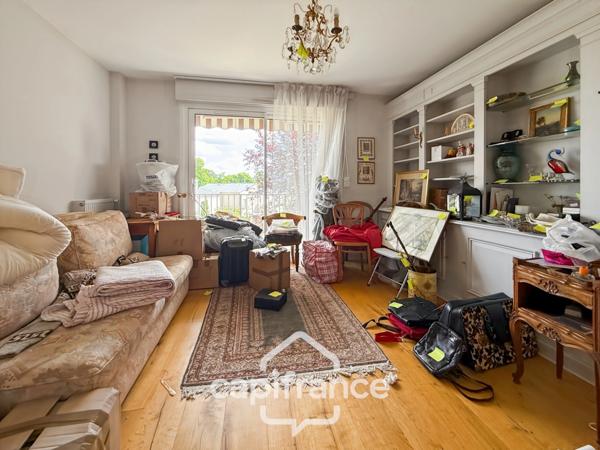 Exceptionnel: appartement 122 m2, 3 chambres, garage, cave à Saint Symphorien