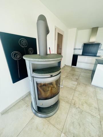 Charmant F3 d'environ 94m² + cave + parking