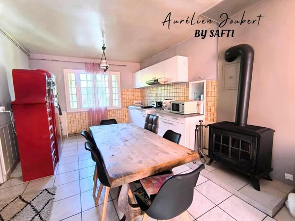Maison de 110 m² avec grand entrepôt, vendue louée