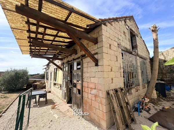 IMMEUBLE AVEC APPARTEMENT, LOCAL COMMERCIAL ET DÉPENDANCE ! FORT POTENTIEL À SAINT-VALLIER !