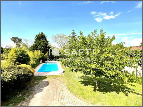 Maison familiale 310m2 avec piscine et garages, proximité centre Lesparre