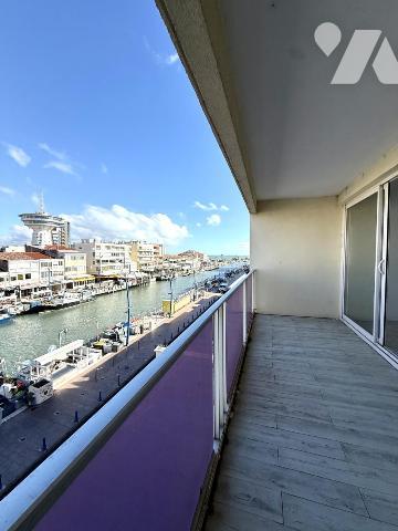 Appartement traversant avec deux terrasses vue canal