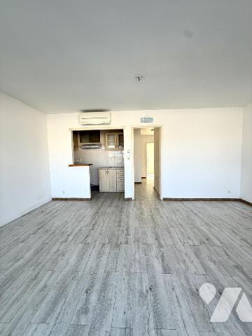 Appartement traversant avec deux terrasses vue canal