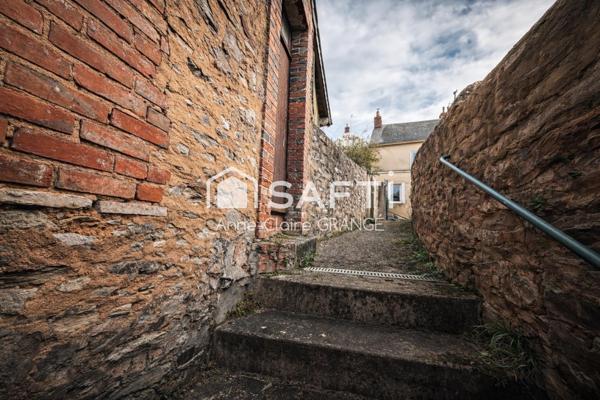 Maison de bourg de caractère – Fort potentiel – Cœur de Sillé-le-Guillaume