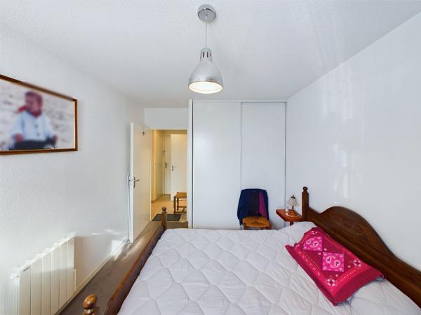 Appartement en rez de jardin avec terrasse et parking