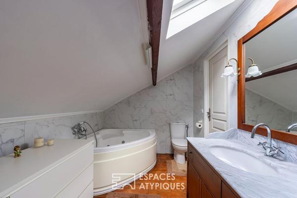 La charmante meulière avec extension et jardin paysagé