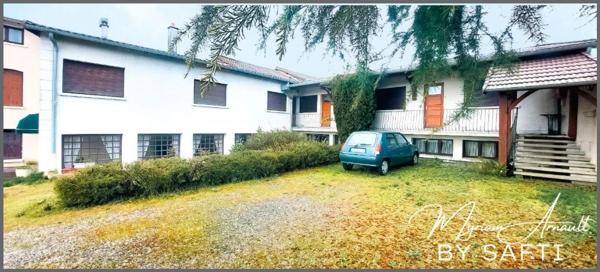 Immeuble 550 m², 10 chambres, salles de réception, bar, cuisine, grange, parking