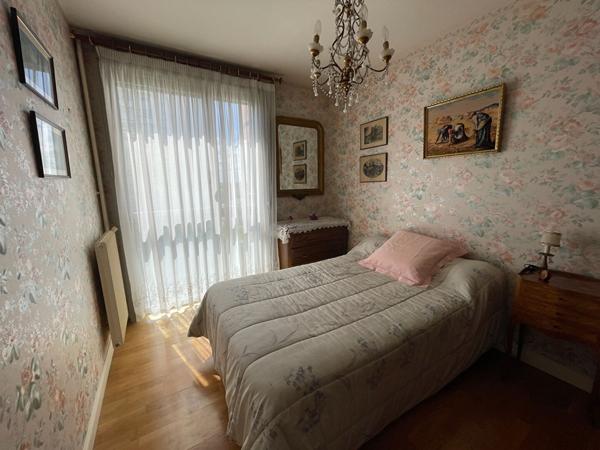 Appartement T5 spacieux avec loggia, cave et stationnement