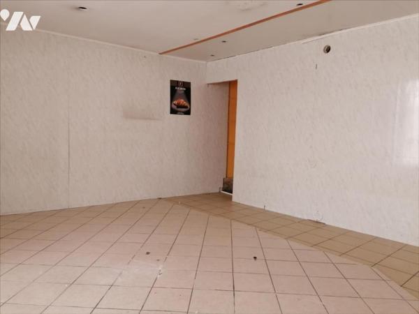 IMMEUBLE local commercial + appartement