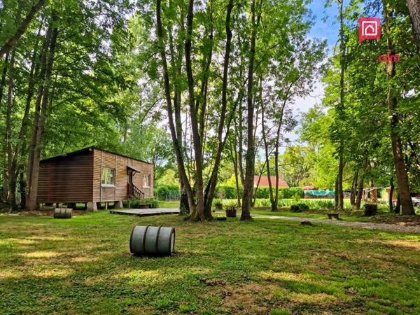 Propriété avec dépendances, parc arboré et fort potentiel
