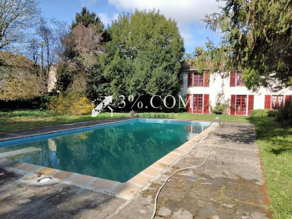 Maison 6 pièce(s) 4 chambre(s) 245 m²