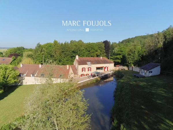 Moulin du XVIII rénové avec dépendance sur un parc de 13920m2