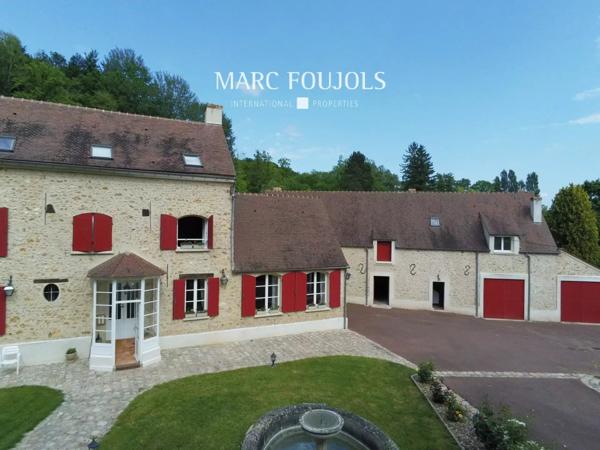 Moulin du XVIII rénové avec dépendance sur un parc de 13920m2