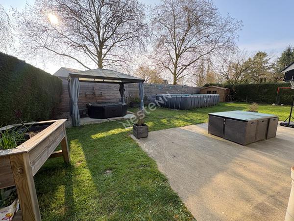 Maison familiale de plain-pied - 4 chambres - jardin - garage - cave