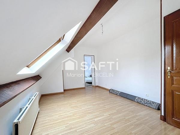 Belle maison familiale en pierre de 170m² environ située en centre bourg de Donnery