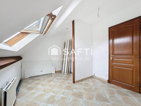 Belle maison familiale en pierre de 170m² environ située en centre bourg de Donnery