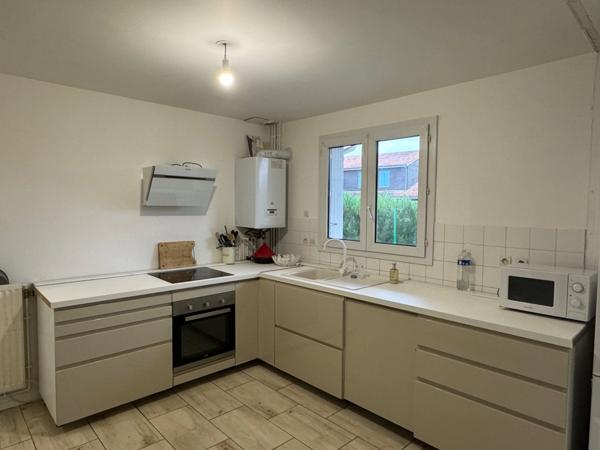 PAVILLON 3 CHAMBRES AVEC GARAGE ET JARDIN