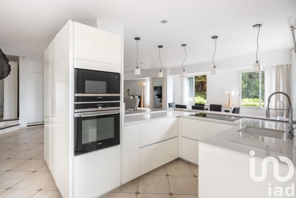 Maison 8 pièces de 303 m² à Corenc (38700)