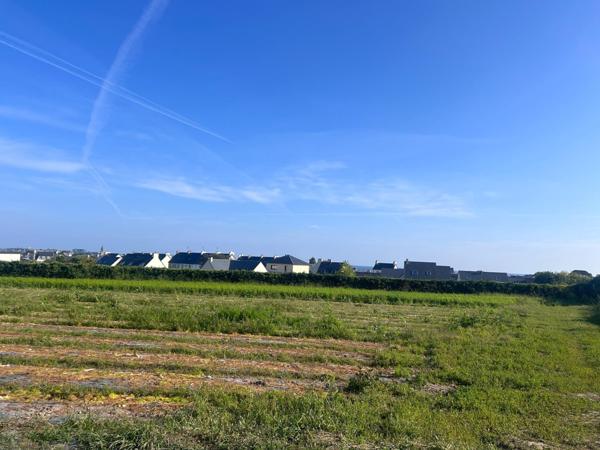 TERRAIN CONSTRUCTIBLE VIABILISE  PROCHE DES COMMODITES