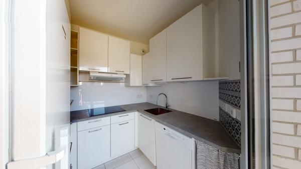 Appartement Asnières Sur Seine 3 pièces 63.44 m2 avec terrasse, cave et parking.