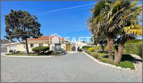 MAISON DE PLAIN PIED AVEC JARDIN
