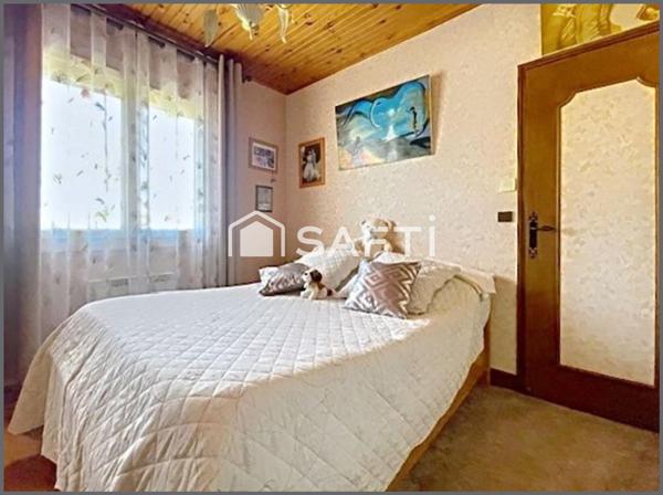 MAISON DE PLAIN PIED AVEC JARDIN