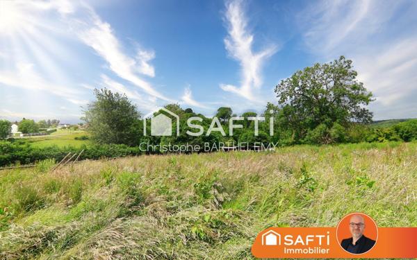 Terrain de 6.563m2 constructible à l'écart de la route