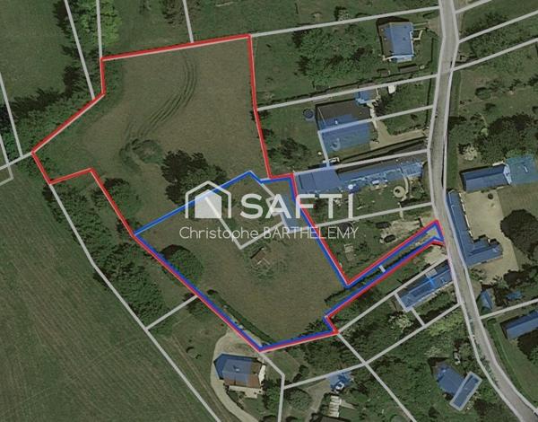 Terrain de 6.563m2 constructible à l'écart de la route