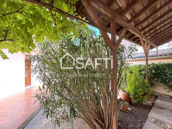 Maison de bourg avec garage et grand atelier