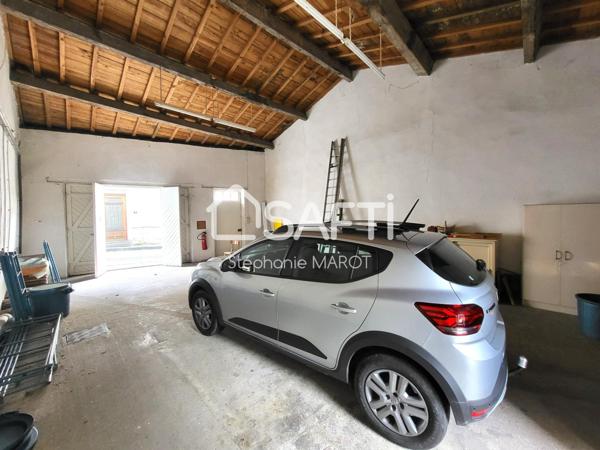 Maison de bourg avec garage et grand atelier
