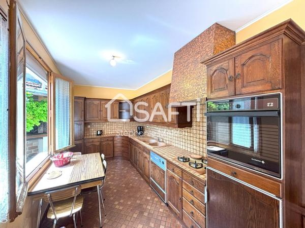 Maison de bourg avec garage et grand atelier