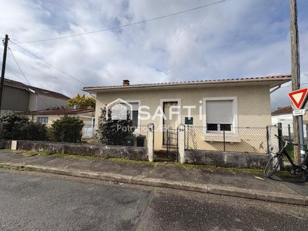 Parcelle 300 m2, maison de plain pied de 70 m2 avec grand garage à rénover