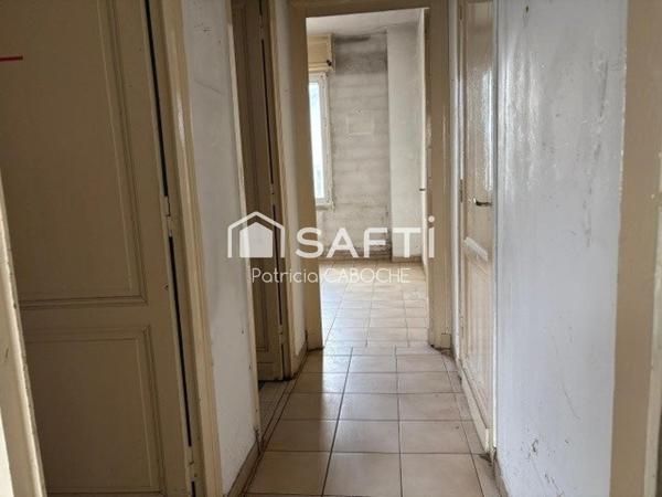 Parcelle 300 m2, maison de plain pied de 70 m2 avec grand garage à rénover