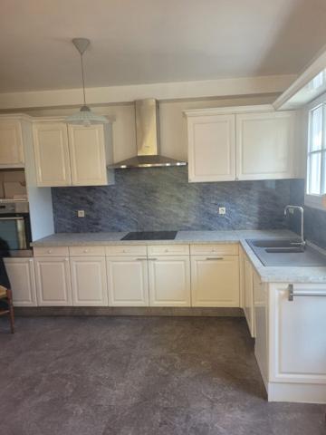 Maison spacieuse à vendre à Saint-Avertin - 5 chambres, jardin et garage