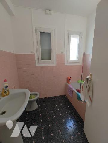 Appartement 3 pièces traversant de 70 m² avec terrasse, balcon, garage et cave