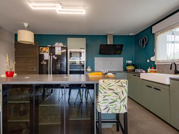 Maison récente d'environ 100 m² habitables avec jardin et terrasse