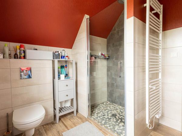 Maison récente d'environ 100 m² habitables avec jardin et terrasse