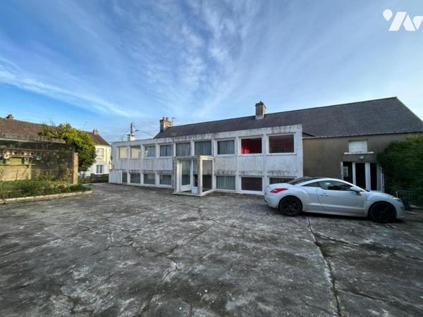 IMMEUBLE DE RAPPORT (deux maisons + un hangar)