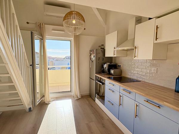 Appartement 3 pièce(s) 48 m² (68 m² hors carrez) + place de stationnement privative