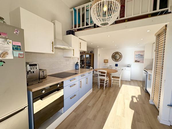 Appartement 3 pièce(s) 48 m² (68 m² hors carrez) + place de stationnement privative