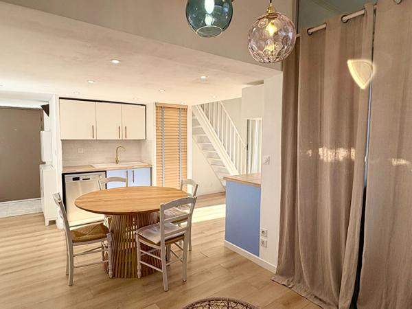 Appartement 3 pièce(s) 48 m² (68 m² hors carrez) + place de stationnement privative