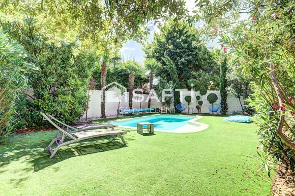Maison de caractère haut de gamme de plus de 200m2 habitables avec jardin paysager et piscine chauffée