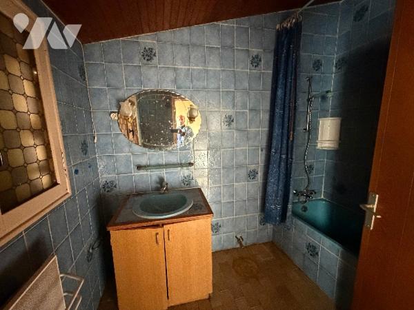 A MORTREE, une maison à usage d'habitation à rénover (59,88m²)