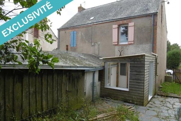 Jolie maison avec  un terrain attenant.