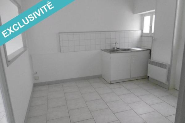 Jolie maison avec  un terrain attenant.